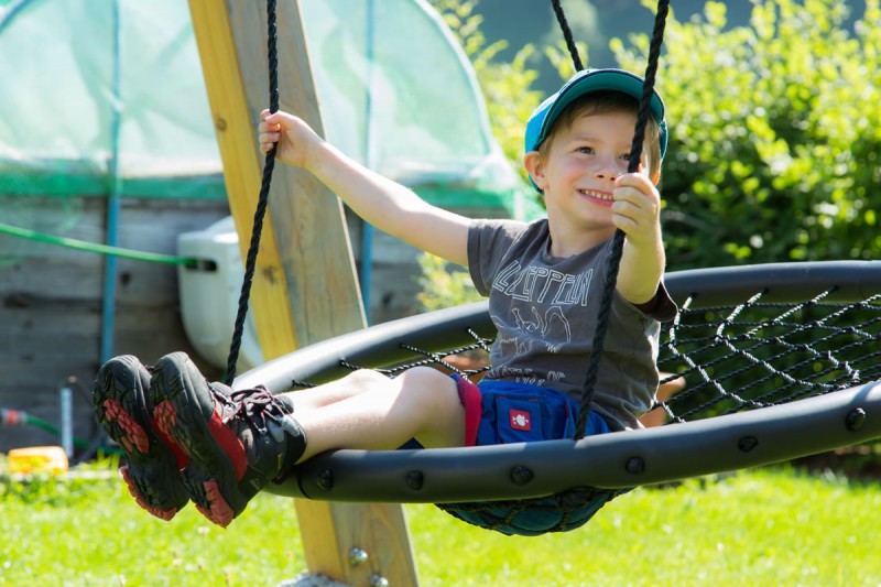 Fun and games on the swing on summer holidays