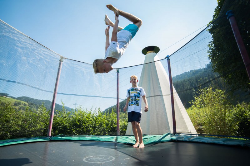 Jumping on the trampoline